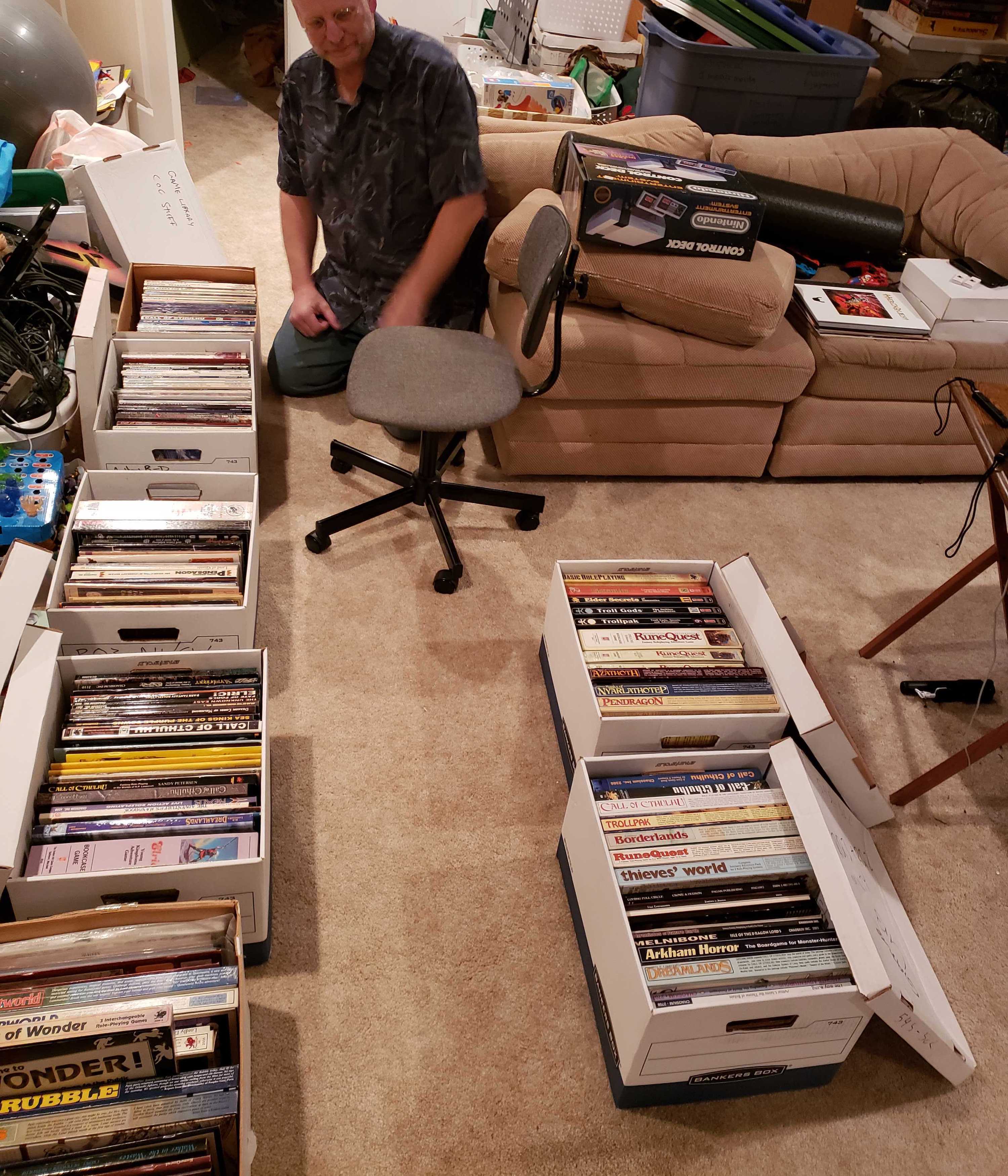 Rick sorting through the Chaosium archives